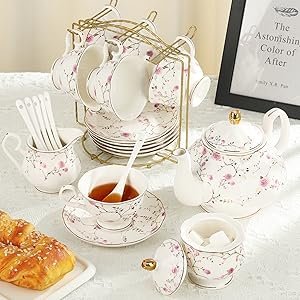 European tea set with tepot cup saucer sugar bowl milk jug hanging on a tea set stand for display