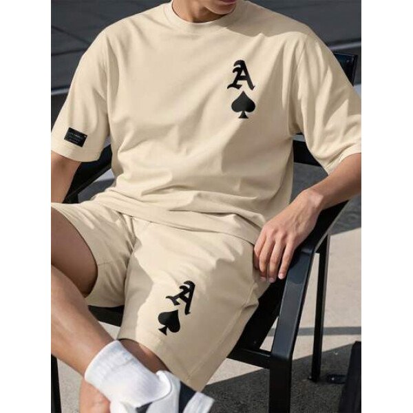 Manfinity Homme Conjunto de 2 piezas para hombres con camiseta de manga corta de cuello redondo con estampado de naipes y pantalones cortos con cordón en la cintura