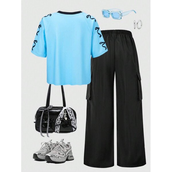 SHEIN Set de 2 piezas de niña preadolescente con camiseta de manga raglán con gráfico al estilo estadounidense y pantalones cargo con bolsillo con aplicación - Image 26