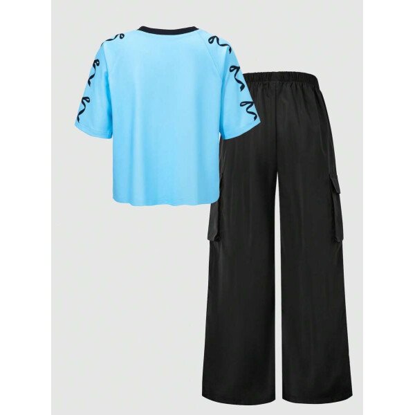 SHEIN Set de 2 piezas de niña preadolescente con camiseta de manga raglán con gráfico al estilo estadounidense y pantalones cargo con bolsillo con aplicación - Image 28