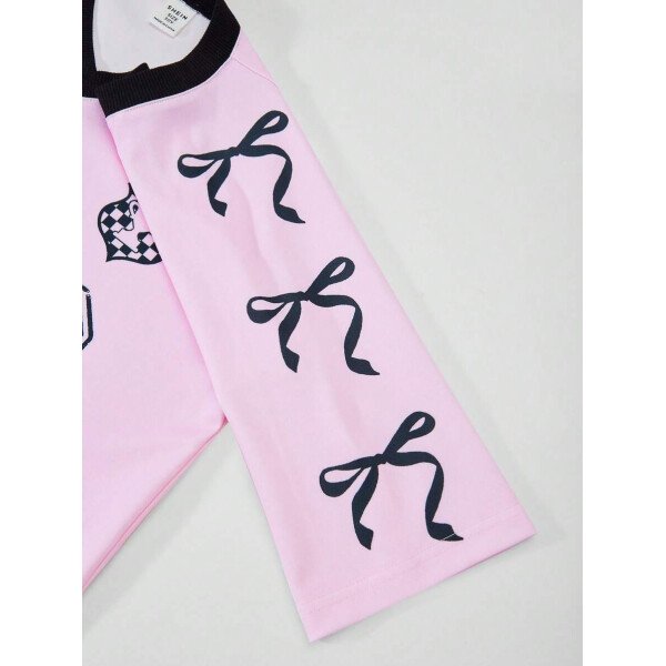SHEIN Set de 2 piezas de niña preadolescente con camiseta de manga raglán con gráfico al estilo estadounidense y pantalones cargo con bolsillo con aplicación - Image 39