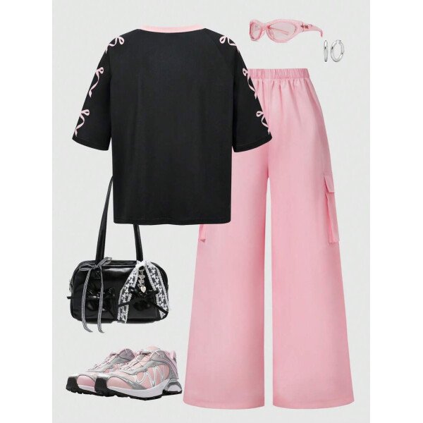 SHEIN Set de 2 piezas de niña preadolescente con camiseta de manga raglán con gráfico al estilo estadounidense y pantalones cargo con bolsillo con aplicación - Image 42