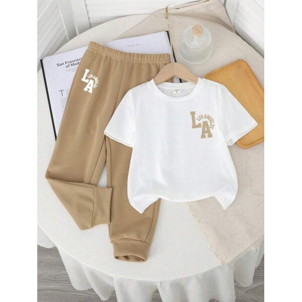 SHEIN Set de 2 piezas compuesto por camiseta de manga corta de cuello redondo y pantalones casuales y sencillos para niño, adecuado para el verano - Image 23