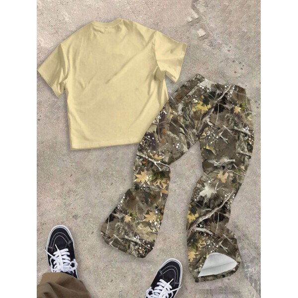SHEIN Conjunto informal de 2 piezas para niño preadolescente con camiseta de cuello redondo con estampado de personaje de dibujos animados y texto "Rich Soon", y pantalones acampanados con estampado de bolsa de dinero y llamas, adecuado para verano, ropa urbana, música rock, casual elegante - Image 81