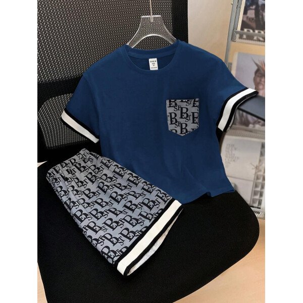 SHEIN 2 piezas Conjunto informal de niño joven con camiseta de cuello redondo de manga corta con bolsillo estampado y pantalones cortos estampados de punto - Image 14