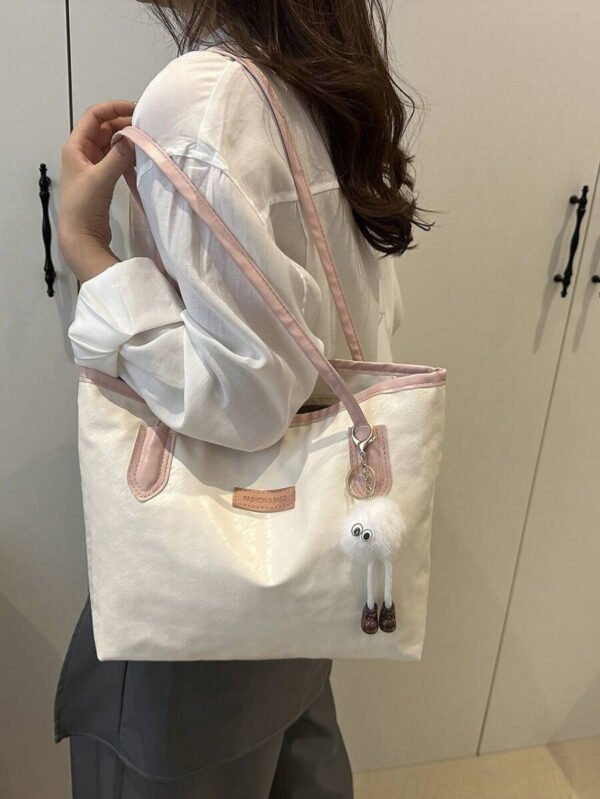 Bolso de hombro versátil y de moda con gran capacidad para mujeres, nuevo bolso de lona tipo tote, diseño preferido, perfecto para la escuela, el transporte y las compras (sin colgante) - Imagen 50
