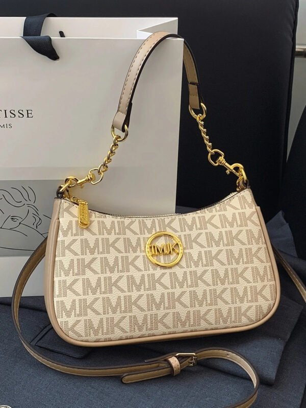 Bolso de hombro clásico, versátil y moderno de tela de PU impermeable con estampado de letra M, con cadena metálica decorativa, estilo baguette francés. Ideal para ir de compras, ir al trabajo y viajar. - Imagen 40