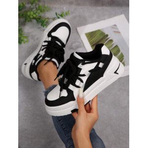Nuevos zapatos de skate para estudiantes mujer primavera 2025 en blanco y negro, zapatillas de moda versátiles y respirables, zapatos casuales estilo Ins