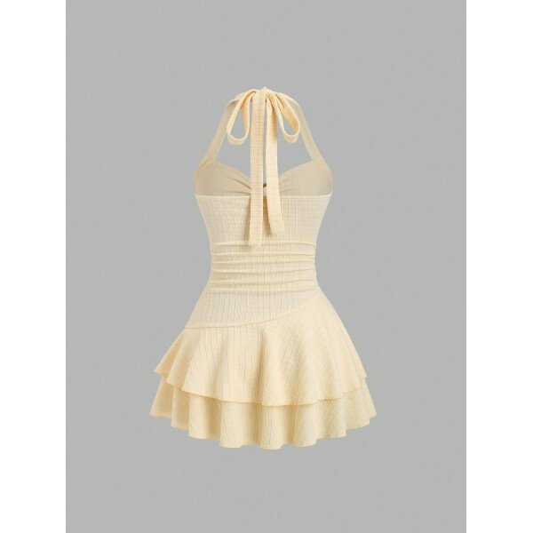 Sweetra Nuevo vestido mini elegante para mujer apropiado para la playa y vacaciones de verano, con tela con textura, cuello halter, lazo delantero, busto fruncido, decoración metálica, falda con volantes en capas y dobladillo juguetón - Imagen 33